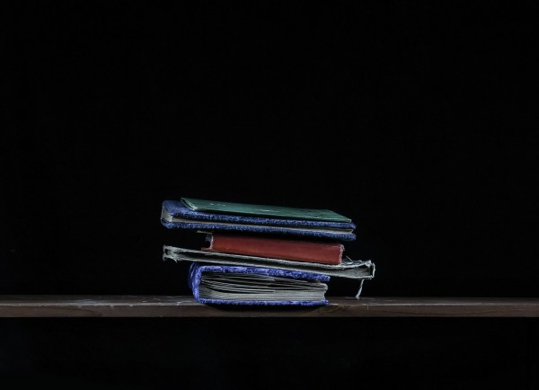 4. Семейные фотоальбомы. 2014год. Пигментная печать. 62х45см<br />"В них история двух семей - моей и жены.<br />Уходили из жизни наши родители, и их альбомы мы забирали себе.<br />На некоторых фотографиях сняты неизвестные нам люди, но они были дороги нашим родителям, были частью их жизни, поэтому мы их  храним. <br />Люблю рассматривать лица людей.<br />Знакомых и незнакомых.<br />Какие-то другие они раньше были."<br />(история жизни предков)